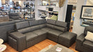 Gray sectional sofa which can be used as a corner couch or sofa bed